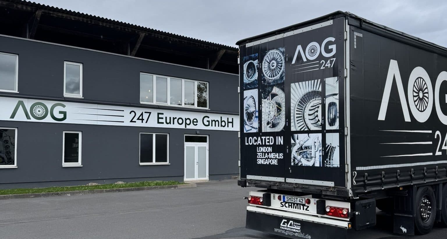The AOG-247 Europe GmbH facility in Zella-Mehlis with a branded delivery truck